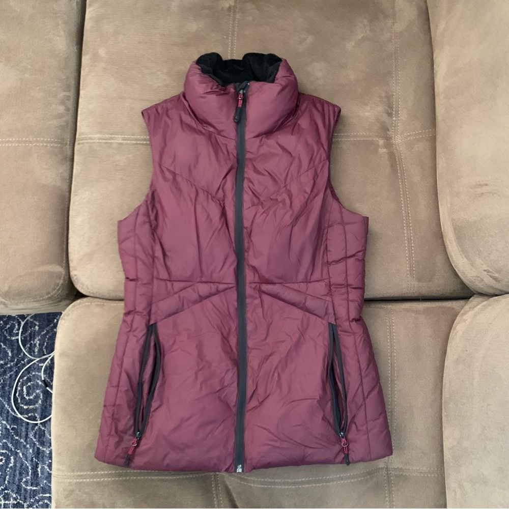 Champion size S synthetic puffer vest, maroon. Gently used.